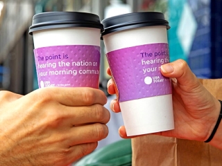 USA Today branded coffee sleeve advertisement